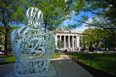 "The Alchemist" by Jaume Plensa sits on the campus of MIT