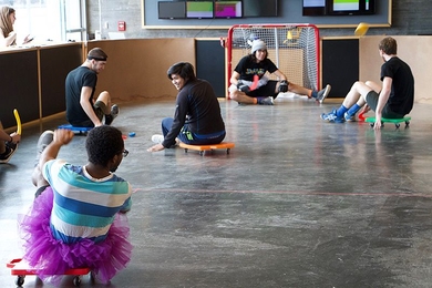 MIT students gear up for the fifth annual Scootah Hockey Championship in Simmons Hall.