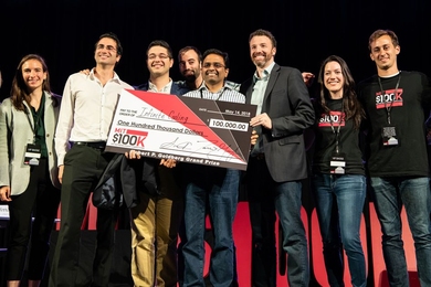 The grand prize winner at this year’s MIT $100K Entrepreneurship Competition was Infinite Cooling, which is developing a system that captures and recycles vaporized water from thermoelectric power plants. Pictured here are the four Infinite Cooling team members, holding the big check (from left): Maher Damak, Karim Khalil, Kripa Varanasi, and Derek Warnick.