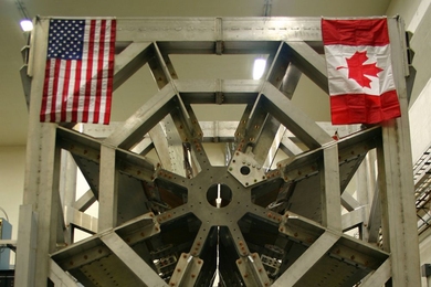 In the QTor magnetic spectrometer, a magnet separates high-energy electrons, which are elastically scattered from protons.