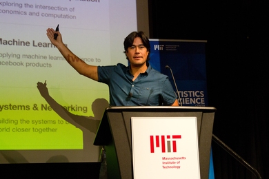 Carlos Gomez Uribe ’02, MEng ’03, PhD ’08, who is an internet tech product and algorithms leader at Facebook, presents during the industry session at the 2018 MIT Statistics and Data Science Conference.