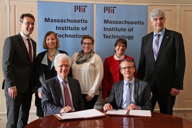 Celebrating a new MIT-Belgium partnership: (standing, l to r) Vincent Blondel, April Julich Perez, Molly Schneider, Cathy Culot, and Peter Lievens; (seated, l to r) Richard Lester and Luc Sels.