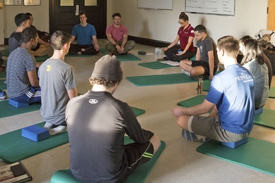 Students practice meditation in the new Meditation/Fitness course offered through the MIT Physical Education and Wellness Program in the Division of Student Life.