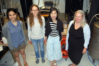 Recipients of a grant from the Heising-Simons Foundation are (l-r) Radha Mastandrea, Carina Belvin, and Shuo Zhang. Professor Lindley Winslow, who established the grant program, is at right. Not pictured: grant recipient Clara Sousa-Silva.