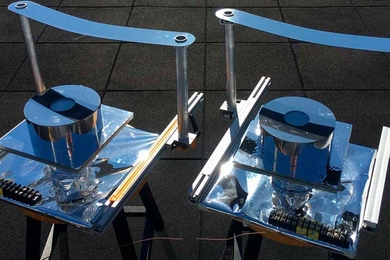 Two versions of the device designed by MIT researchers, using a strip of metal to block direct sunlight, were built and tested on the roof of an MIT building to confirm that they could provide cooling well below ambient air temperature.