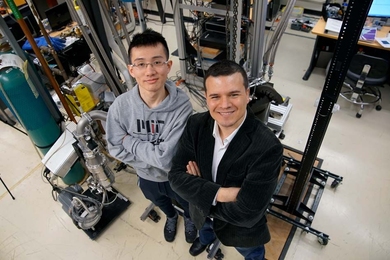 Pablo Jarillo-Herrero (right), an associate professor of physics at MIT, was honored with Physics World's Breakthrough of the Year for his group's discovery of  “magic-angle” graphene, a “promising technique for adjusting the electronic properties of graphene.” Graduate student Yuan Cao (left) was a lead researcher in the work.