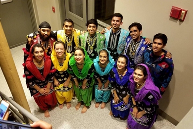 Members of the MIT Bhangra dance team pose for a picture after a performance.