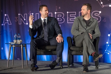 Former major league baseball pitcher and current MIT Sloan student Chris Capuano, left, speaking during a panel called “Unlocking Potential: The Next Generation of Tracking Data,” during the MIT Sloan Sports Analytics Conference, Saturday, March 2, 2019.  