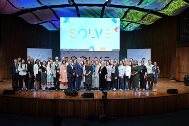 MIT President L. Rafael Reif and Solve Executive Cirector Alex Amouyel recognize Solver teams on stage.