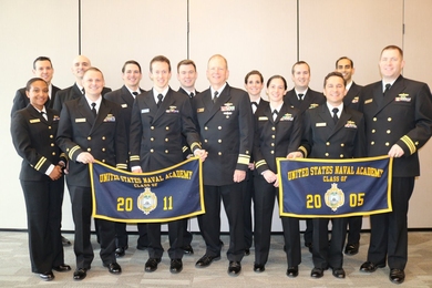 Students enrolled in the MIT Course 2N program who also graduated from the U.S. Naval Academy pose with Rear Admiral Brian Antonio, a curriculum sponsor for the program. 