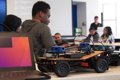 "We don't want to lock anybody out because they haven't had a chance to program before," says MIT Lincoln Laboratory staff member Andrew Fishberg, of the RACECAR program he developed and taught at the Roxbury Innovation Center in Boston.