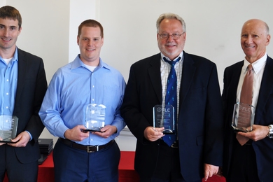 Lincoln Laboratory employees (left to right) William Moulder, Jayme Selinger, David Pronchick, and Jeffrey Herd accept the FLC Excellence in Technology Transfer Award.