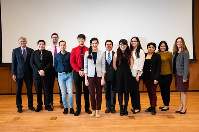 Members and supporters of MIT Lincoln Laboratory's Hispanic/Latino Network gather with Natalia Guerrero (sixth from left) after her keynote address.