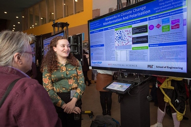 Madeline Abrahams, an EECS senior and MIT/Tang Family FinTech SuperUROP scholar, presents her work investigating the spread of misinformation related to climate change via algorithmic aggregation platforms at the SuperUROP Showcase.