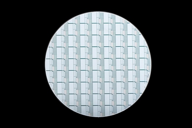 This 8-inch wafer contains phase-change pixels that can be controlled to modulate light. Researchers are studying the properties and behaviors of the pixels to inform the creation of future devices that use phase-change materials.