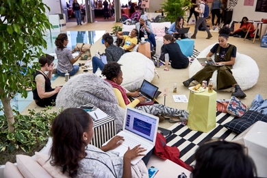 Photo of women at a hackathon
