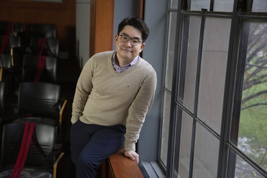 Hyunwoo Yuk near a window on MIT's campus