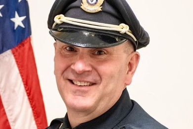 Headshot photo of MIT Police Sergeant Brian J. Sousa Jr. in uniform.