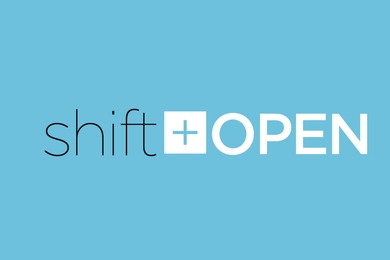 The shift+open logo. “Shift” is lowercase in a light black font; “open” is all capitalized in a heavy white font, and the plus sign is in a white box between them