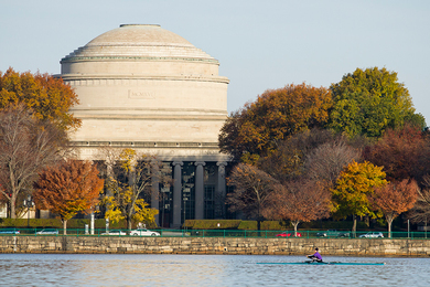 The MIT Dome and Killian Court seen from across the Charles River in autumn, with fall foliage