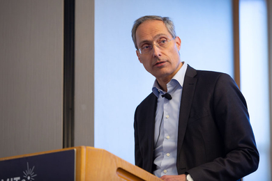 Yuri Sebregts speaks at a lectern