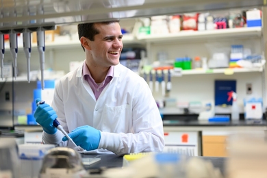 Louis DeRidder working in a lab
