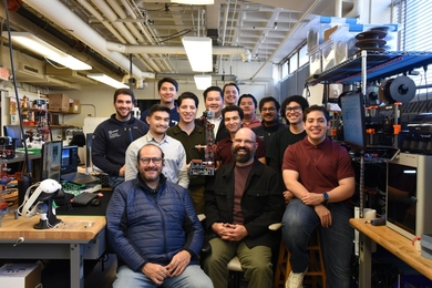 12 MIT and Tecnológico de Monterrey students in the FrED factory at MIT.