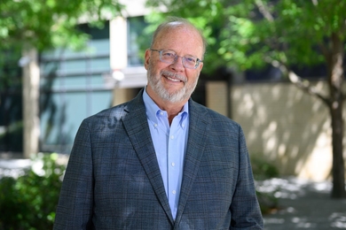 George Tynan outside on a sunny day
