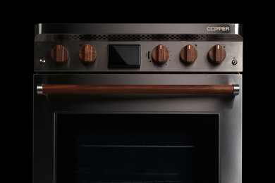 Copper’s stove with wood-style knobs.