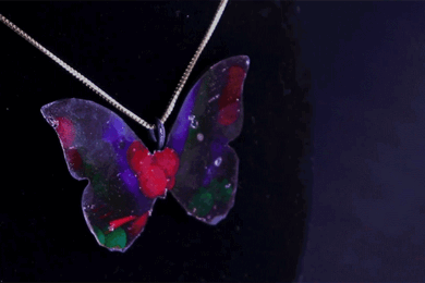 A multicolored butterfly pendant